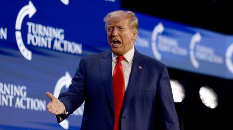 Former US President Donald Trump speaks at the Turning Point Action conference on Saturday in West Palm Beach, Florida.