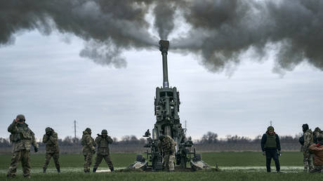 FILE PHOTO: Ukrainian soldiers fire at Russian positions from a US-supplied M777 howitzer in Kherson region, Ukraine, Jan. 9, 2023.