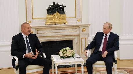 FILE PHOTO: Azerbaijan President Ilham Aliyev and Russian President Vladimir Putin