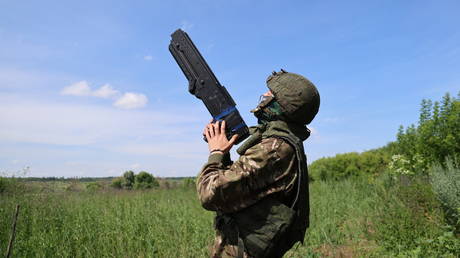 A Russian service member holds an anti-drone gun in the course of Russia's military operation in Ukraine.